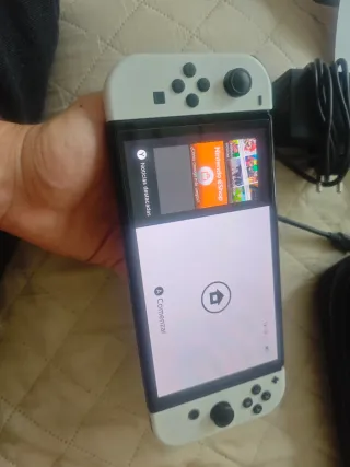 Nintendo Switch OLED + 20 giochi + custodia