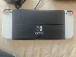 Nintendo Switch OLED + 20 giochi + custodia