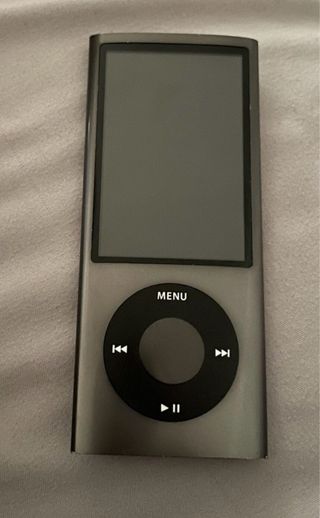 Minicadena Panasonic SC-HC25 + iPod Nano gris 5ª