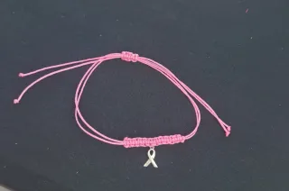 Pulsera lazo rosa plata