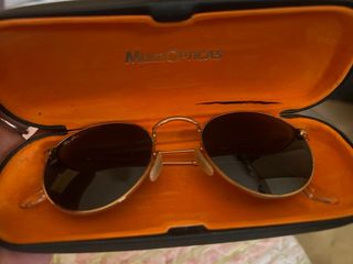 Gafas de sol Ray-Ban doradas y verdes