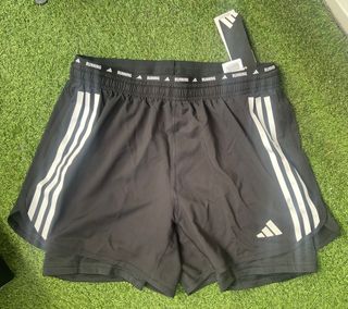 Pantalón running Adidas Talla L con etiqueta