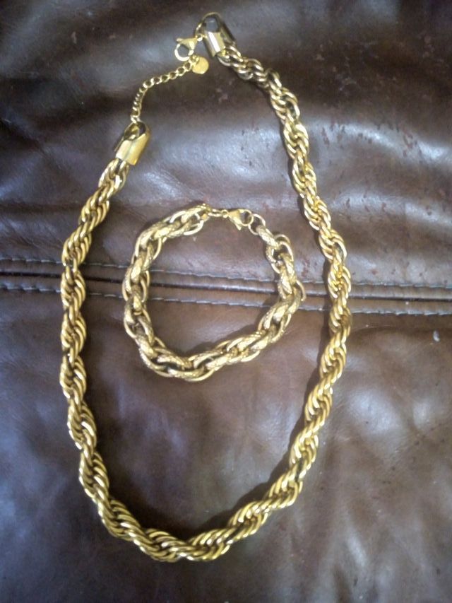 Conjunto acero dorado