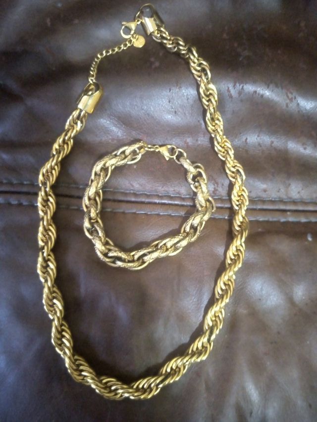 Conjunto acero dorado