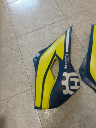 Tapas Laterales Husqvarna 2013-2016