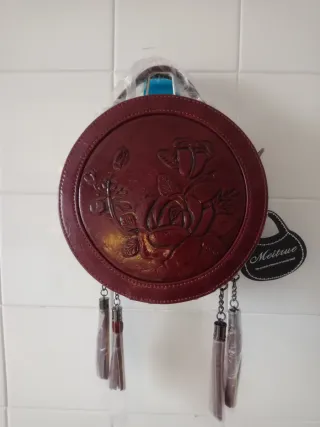 Bolso redondo MeitRUE con flores y flecos