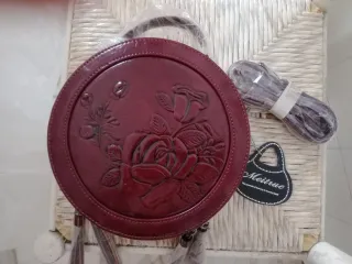 Bolso redondo MeitRUE con flores y flecos