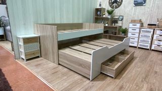 Cama nido con cajones madera y blanco