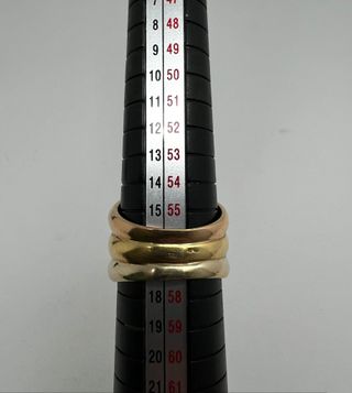 Anillo de oro combinado de 18k. Peso: 8.24 gr