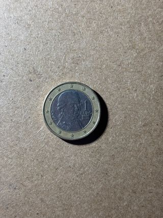 Moneda 1€ Austria Mozart 2002 error acuñación