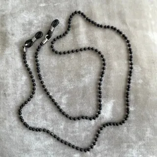 Cuelga gafas metálico negro