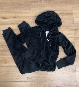 Tuta in peluche nera taglia XS/S