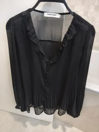 Blusa negra transparente T42 con forro por delante