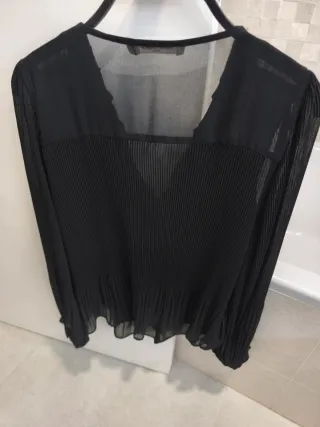 Blusa negra transparente T42 con forro por delante