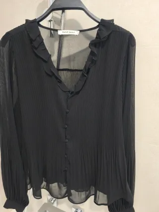 Blusa negra transparente T42 con forro por delante