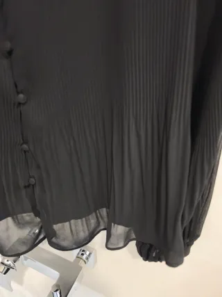 Blusa negra transparente T42 con forro por delante