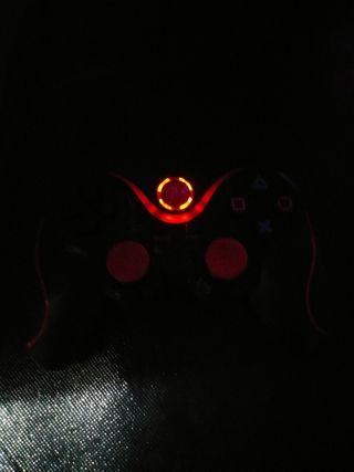 Mando PS3 Sony Negro con detalles rojos