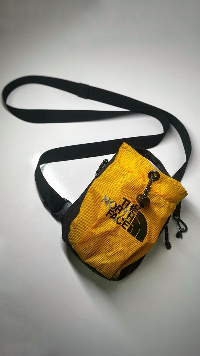 Bandolera The North Face amarilla y negra