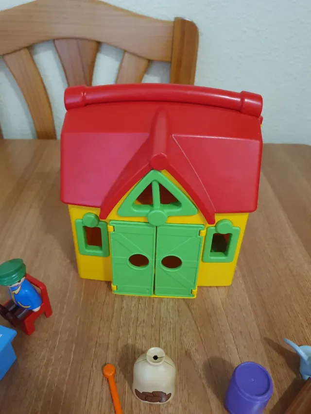 Casa Playmobil con figuras y accesorios