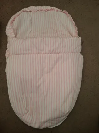 Saco silla coche rosa y blanco