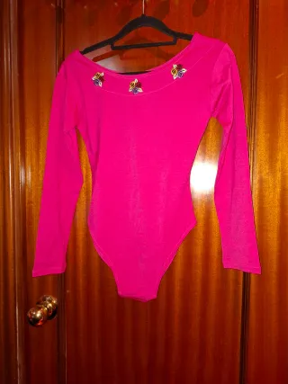 Body rosa manga larga con flores