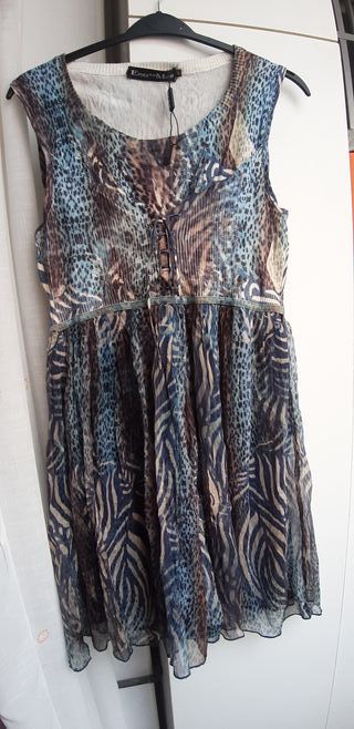 Vestido nuevo sin estrenar con etiqueta. Tela muy