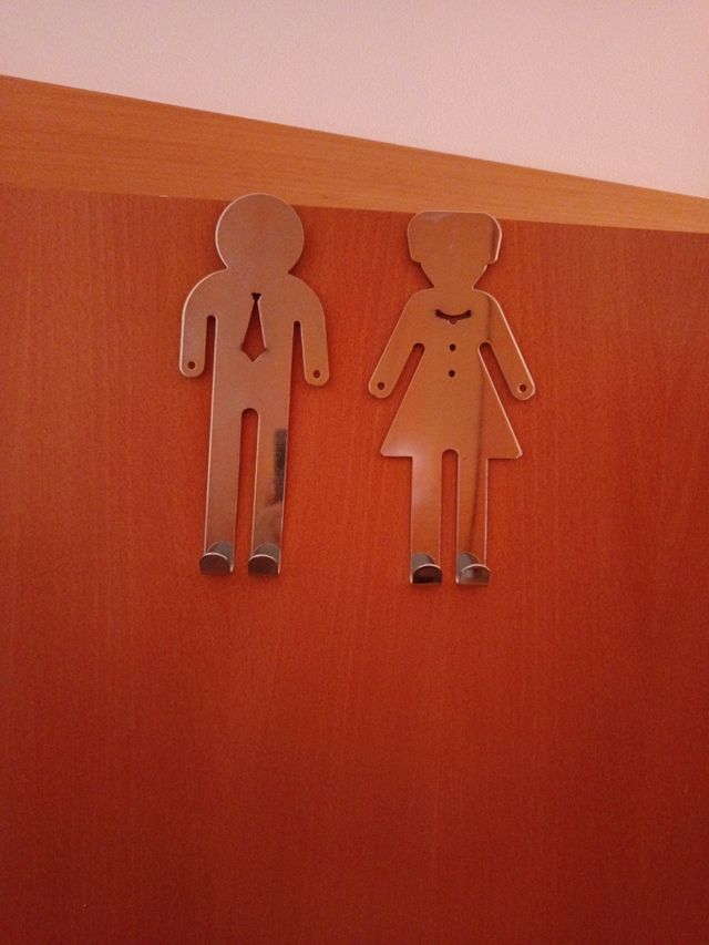 Colgador puerta hombre y mujer metal