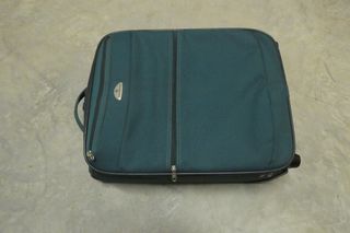 Maleta de viaje Samsonite verde mano