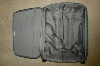 Maleta de viaje Samsonite verde mano