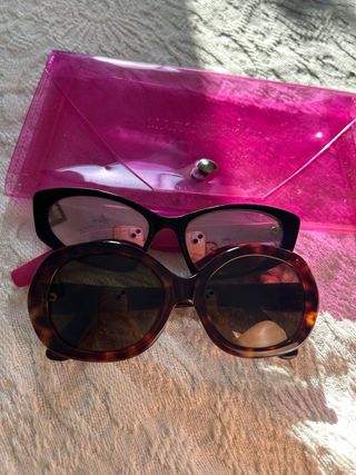 Two sunglasses Dolce & Gabbana and The Marc Jacobs