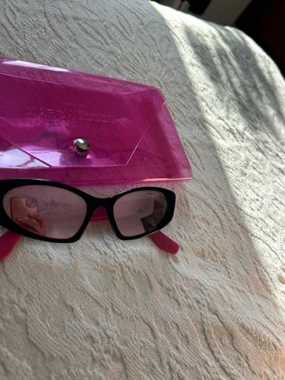 Two sunglasses Dolce & Gabbana and The Marc Jacobs