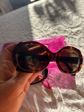 Two sunglasses Dolce & Gabbana and The Marc Jacobs
