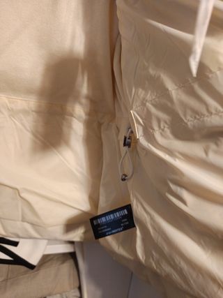 Plumero Zara cuello alto beige talla L