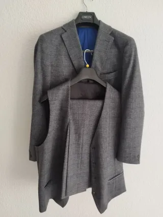 Traje de hombre gris talla 52