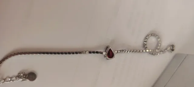 Bracciale tennis con cuore rosso argento