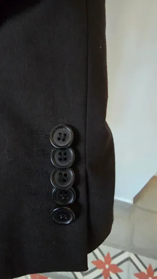 Traje de chaqueta y pantalón negro