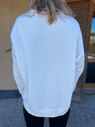 Felpa panna con maniche a treccia