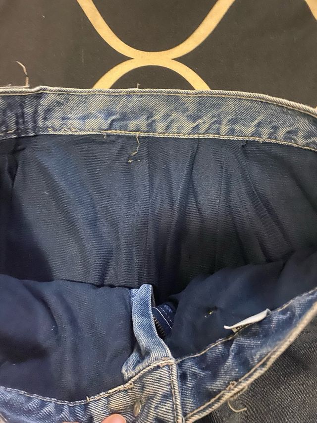 Jeans cargo blu con tasche