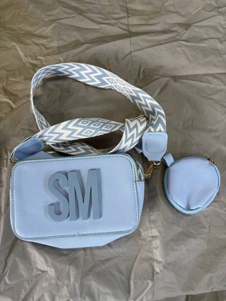 Borsa azzurra con tracolla