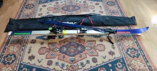 Esquís Rossignol con bastones y funda