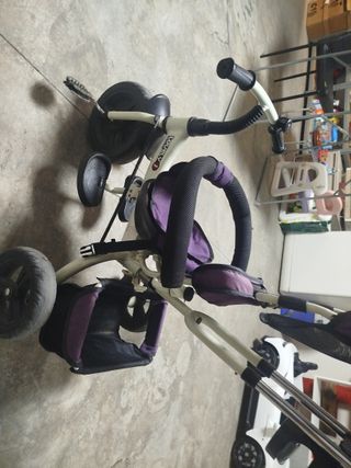 Triciclo morado para niña
