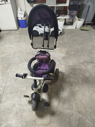 Triciclo morado para niña
