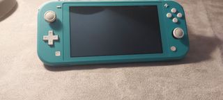 Nintendo Switch Lite Azul Turquesa y 2 juegos 