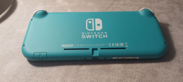 Nintendo Switch Lite Azul Turquesa y cargador