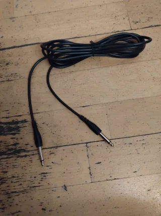 Guitarra Eléctrica OQAN Infantil (1/2) + Mini Amp.