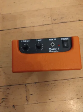 Guitarra Eléctrica OQAN Infantil (1/2) + Mini Amp.