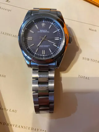 2 Rolex Oyster uno azul oscuro y otro blanco