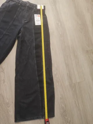 Pantalón vaquero ancho gris con jareta en negro