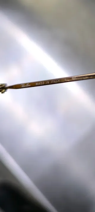 Gafas de sol Ray-Ban doradas y marrones