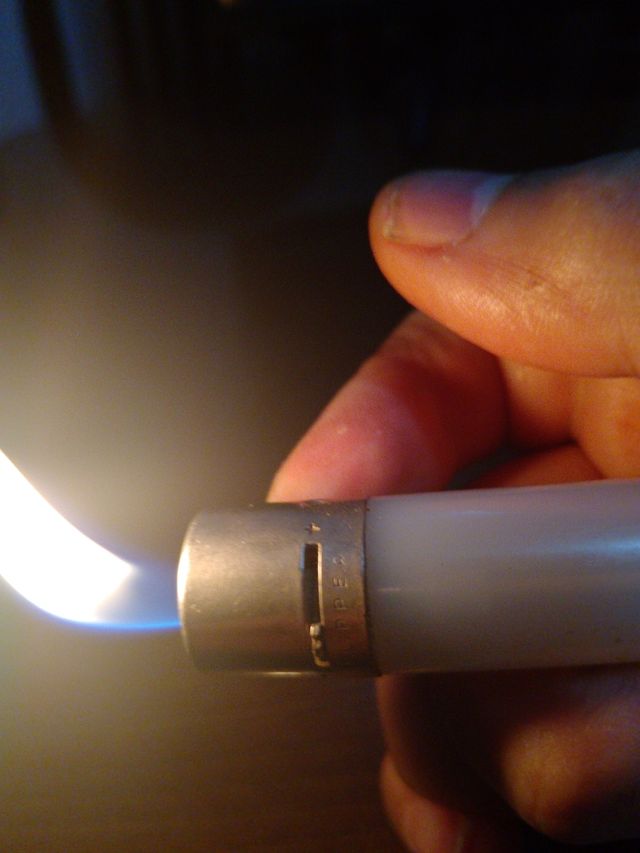 Mechero Clipper antiguo con regulador